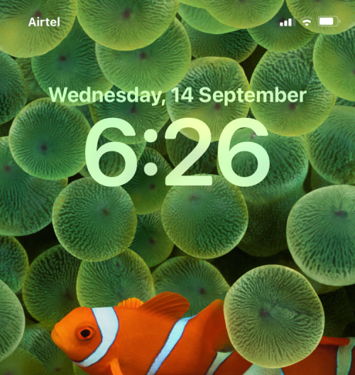 Uzamknutá obrazovka IOS 16: Ako zobraziť celé hodiny vpredu alebo nechať objekt vpredu