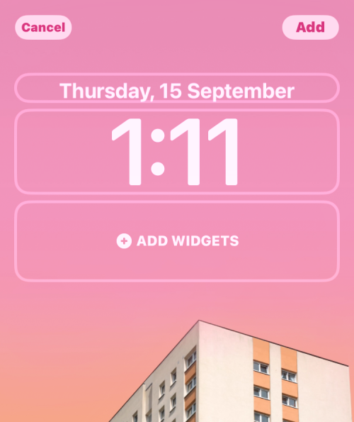 Ako dať čas za tapetu v systéme iOS 16